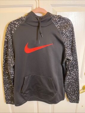 NIKE  Black Pullover Hoodie with Bright Coral Swoosh and Patterned Sleeves